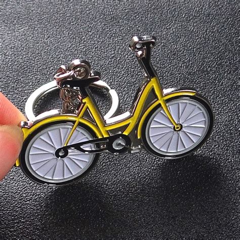 gratis verzending door dhl  stkspartij metalen geel mobiele fiets sleutelhangers