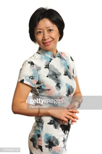 Attractive Mature Asian Woman Wearing Traditional Dress