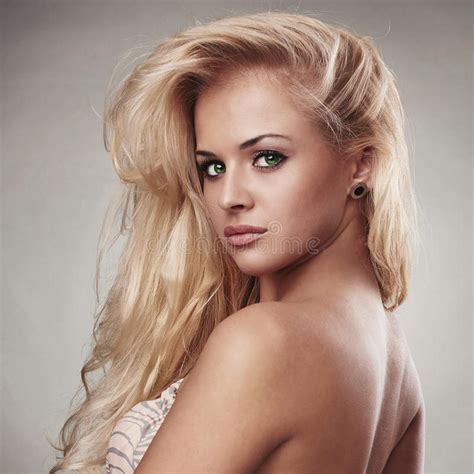 sensitive beautiful blond woman hairstyle salon xy