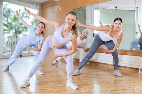 Cheerful Energetic Women Amateur Dancers Of Different Ages Moving Leg