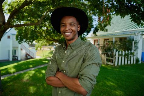 mixed race male farmer standing  traditional farm house stock image image  small team