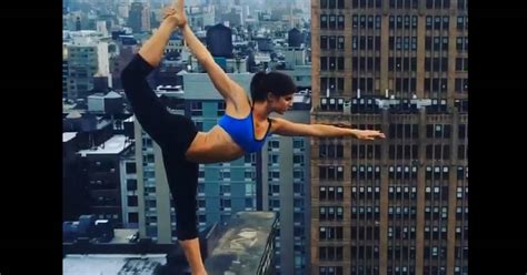stunning  dangerous stunt yoga pose  ledge sparks debate