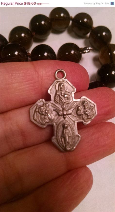 on sale today 1940s old silver tone four way cross religious medal