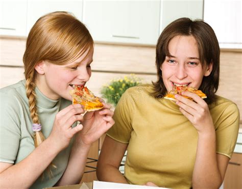 teenage girls eating pizza stock image image of girl 11799779