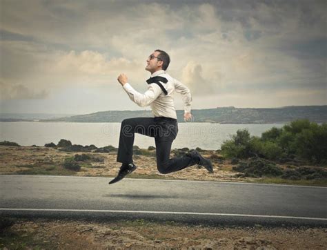 businessman running jump stock image image  active