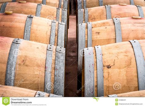 American Oak Barrels With Red Wine Traditional Wine Cellar Stock Image