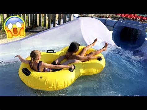 sliding scary tunnels  stories high waterslide outdoor waterpark resort tube ride adventure