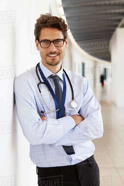portrait  young male doctor  stethoscope smiling stock photo