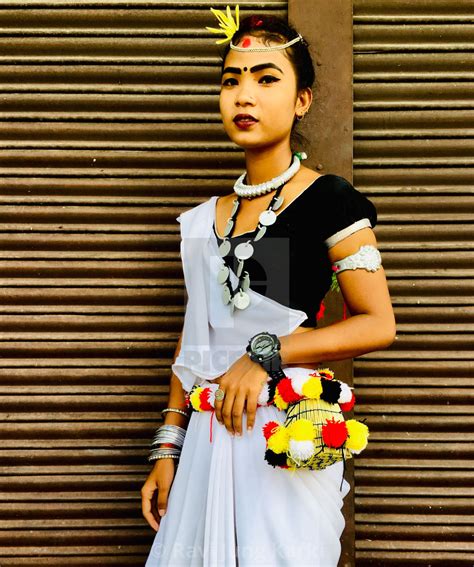 Nepalese Woman Tharu Community Wears Ethnic Jewelry And Traditional Dress