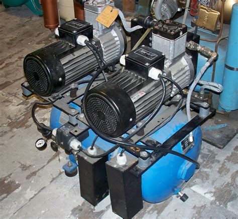 custom air dual  hp compressor pre owned dental