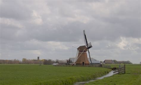 de klaarkamstermolen  het friese landschap bij rinsumageest holland molen holland landschap