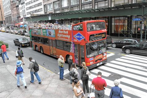 double decker bus tour guides may get pink slips as gray