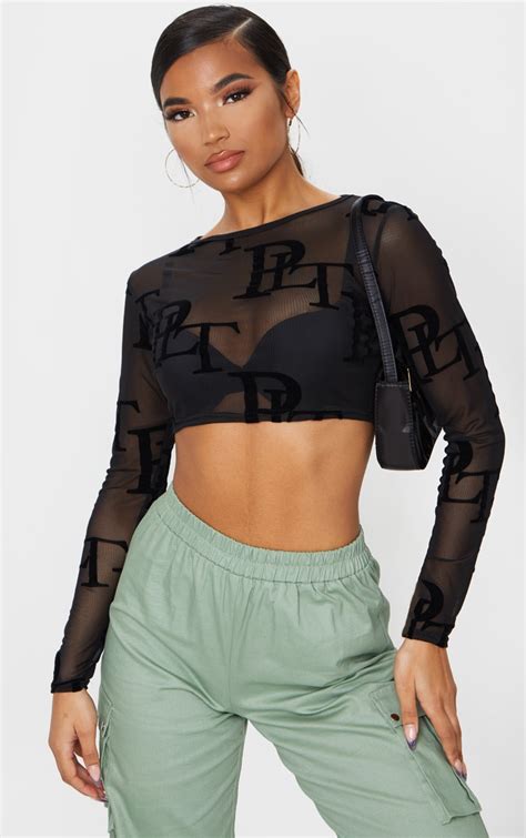 Prettylittlething Black Flock Long Sleeve Crop Top Prettylittlething Usa