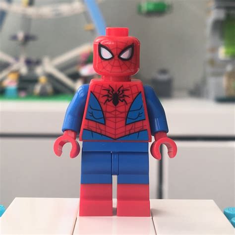 lego spider man minifigure  dark red web pattern blue legs brick
