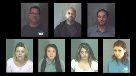 7 accused of running prostitution business next to police station
