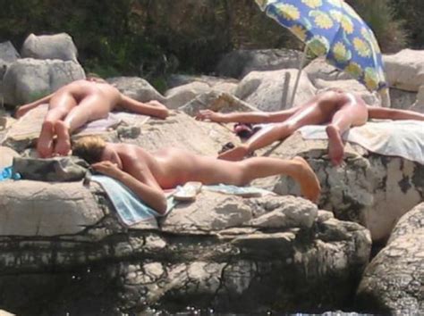 naked people having sex on a beach xxx photo