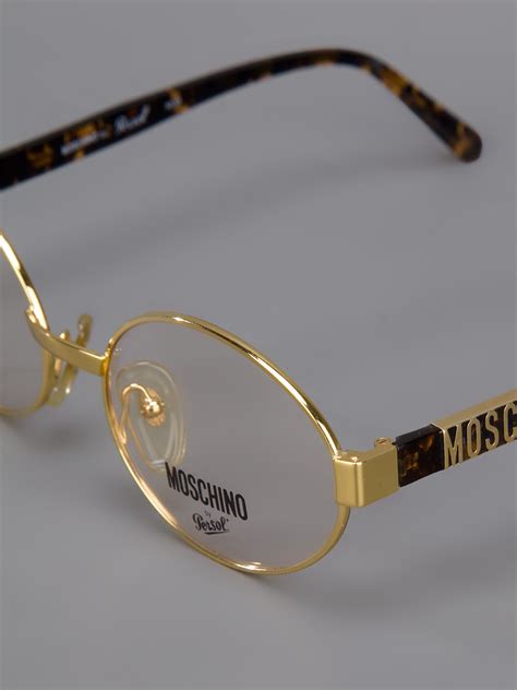 Moschino Round Frame Glasses In Metallic Lyst