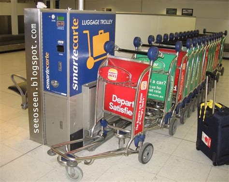 photo airport luggage trolleys air airport empty   jooinn