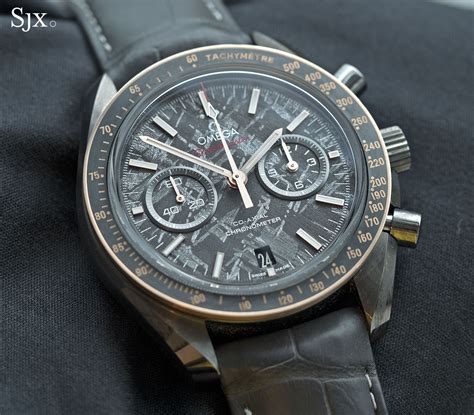 primer  meteorites hands    omega speedmaster grey side   moon meteorite