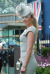 hold onto those hats drunken racegoers feel the effects of a champagne