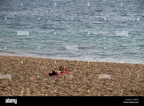 Young Woman Topless Relaxing Sunbathing On Beach Alone Mallorca Majorca