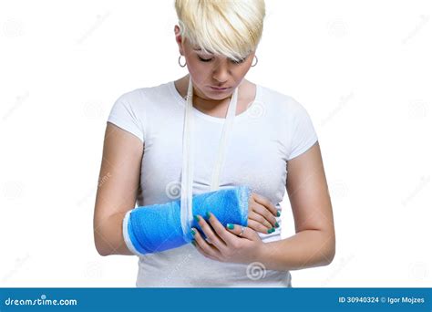 woman holding painful broken arm stock photo image  accident hurt