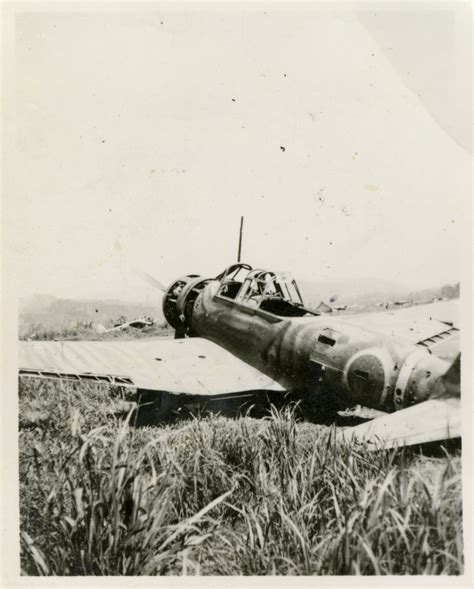 damaged japanese dive bomber   unknown location  digital collections   national