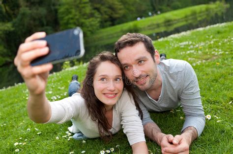 Young Couple Taking Selfie Picture At The Park Stock Image Image Of