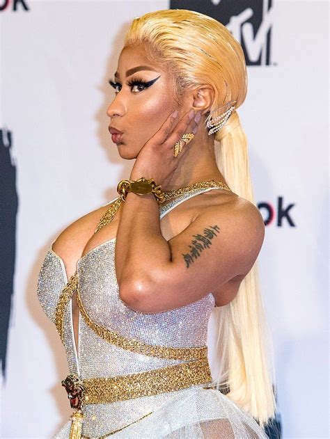 Nicki Minaj Showing Off Thick Caked On Makeup And Her Blonde Lace