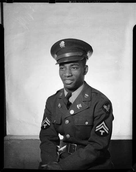 portrait of smiling man wearing belted u s army uniform