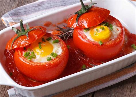 Baked Eggs In Tomatoes With Cheese