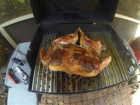 spatchcocked and brined grilled turkey grill grate