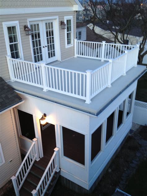 Flat Roof With Railings And A Screened In Porch Porch Design Decks