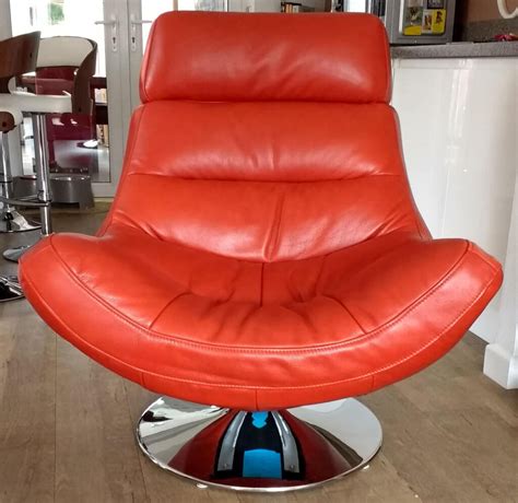 leather swivel chairs burnt orange  chrome base  renfrew