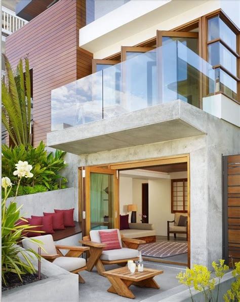 love  upstairs balcony serving  covered porch downstairs tropical house design modern