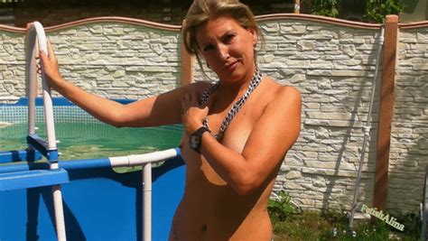 Fetishalina Shiny Latex And More Only In Chain Thong In An Outdoor Pool