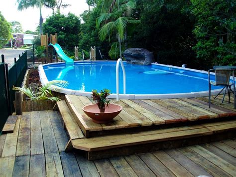mesmerizing oval swimming pools  deck  backyard
