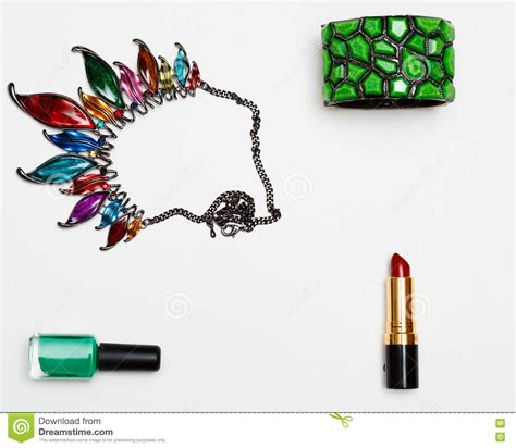 flat lay feminini accessories collage  glasses lipstick bracelet