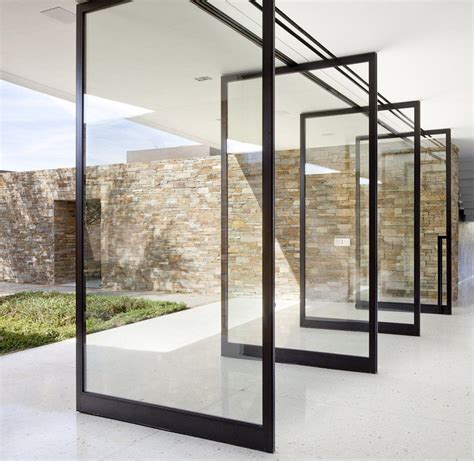 pivot doors glass google search glass house design architecture