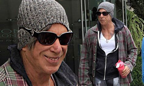 mickey rourke wears very tight camouflage leggings as he steps out in