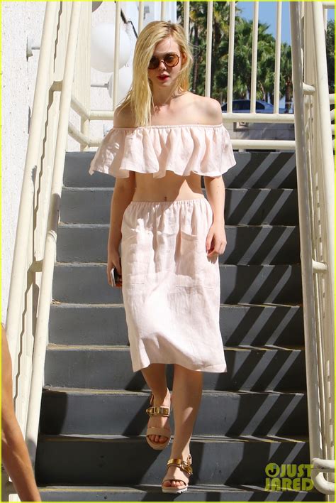 Elle Fanning Shows Off Tiny Waist And Shoulders In Ruffled