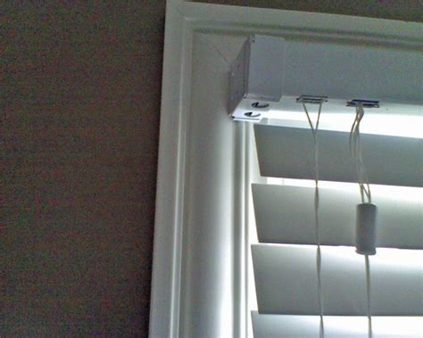 hang iside mounting  slat faux wood blinds   window pictured