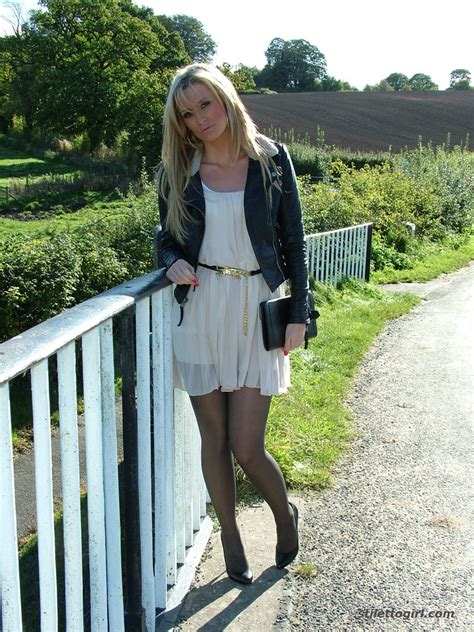Gorgeous Blonde Erin Is Outdoors Showing Off Her Shiny