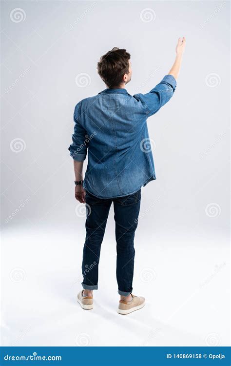 view   casual man standing  white background stock photo