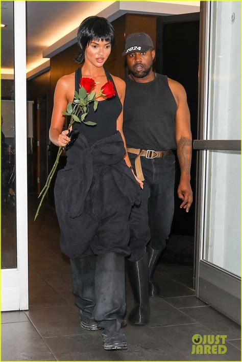 kanye west seemingly ts juliana nalu red roses during night out