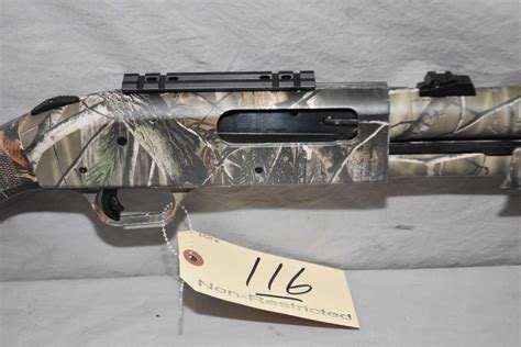 mossberg model  ulti mag  ga   pump action shotgun   rifled fluted bbl camo tone
