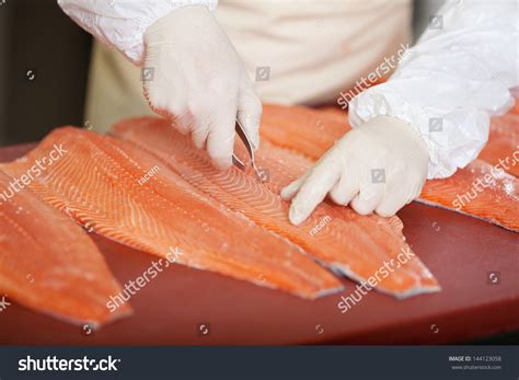 workeraas hand deboning salmon  fish market stock photo  shutterstock
