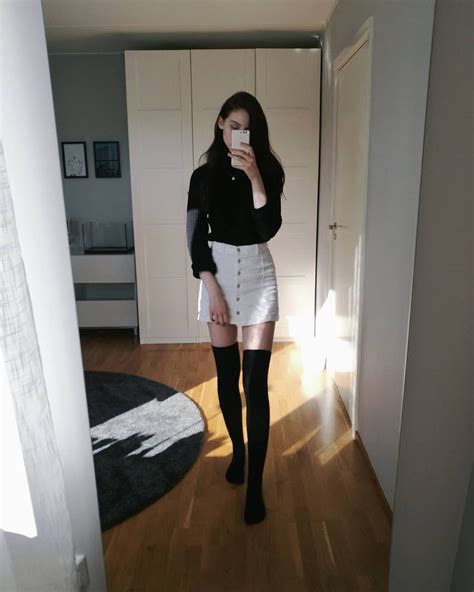 white skirt and knee high socks