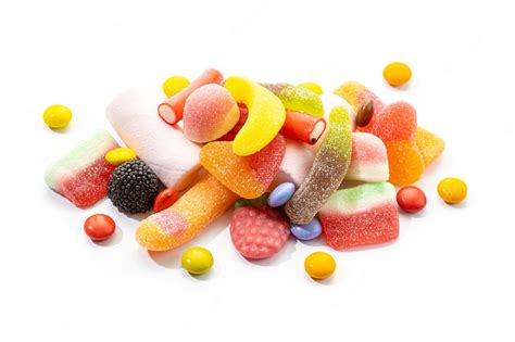 premium photo assortment  candies  sweets isolated  white