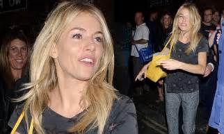 sienna miller cuts casual figure after theatre trip